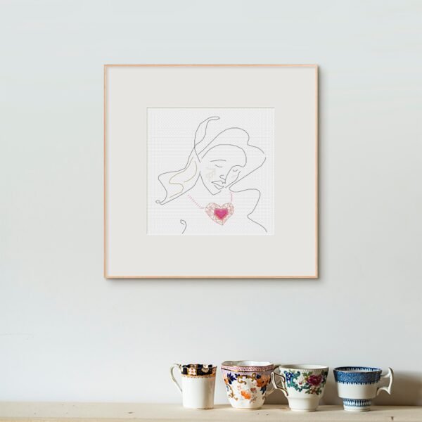 girl with heart necklace easy cross stitch pattern